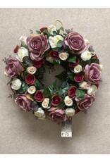 Zijden bloemstuk paars 75 euro