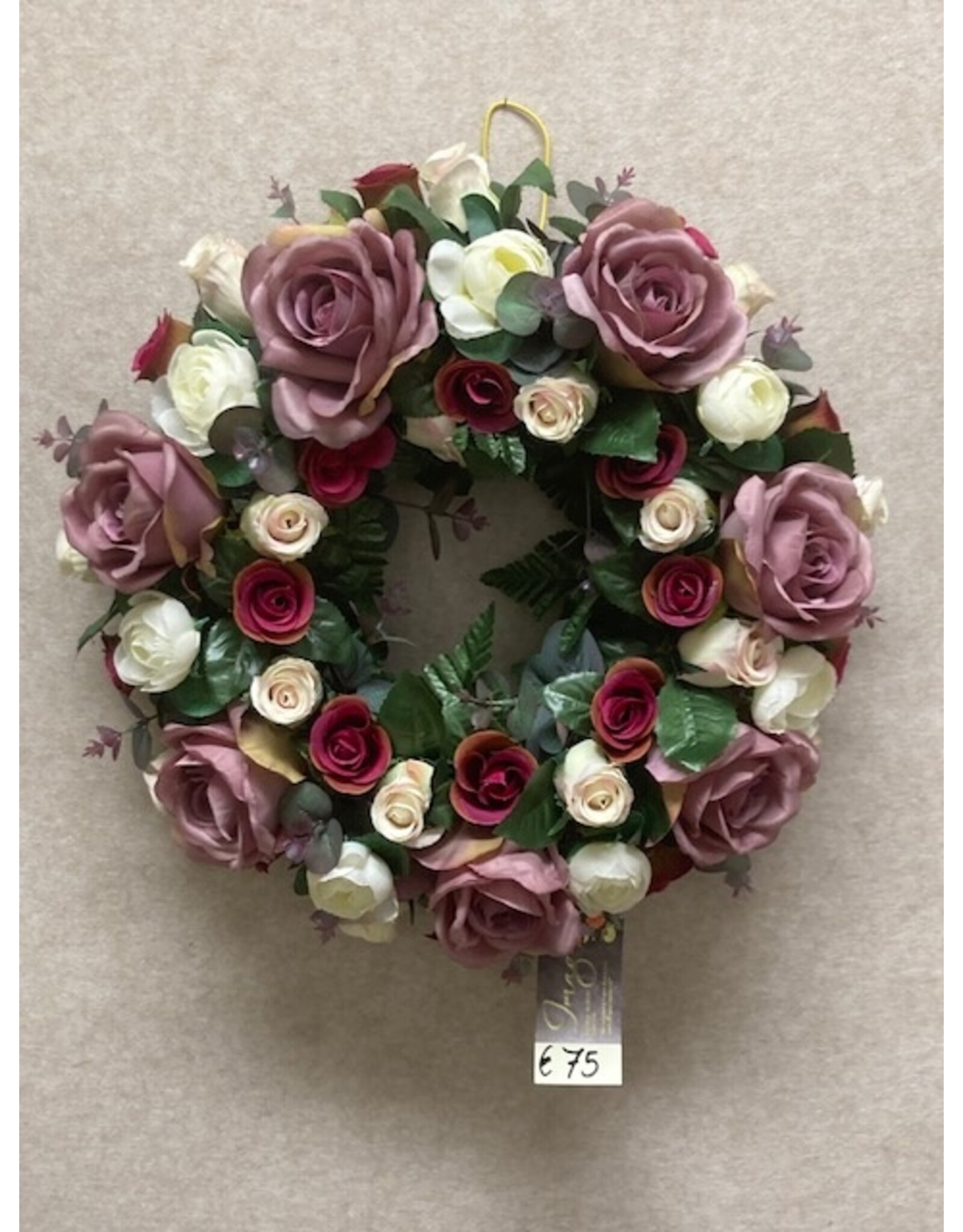 Zijden bloemstuk paars 75 euro