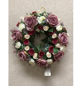 Zijden bloemstuk paars 75 euro