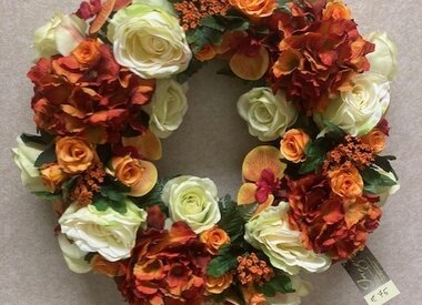 Zijden bloemstuk oranje