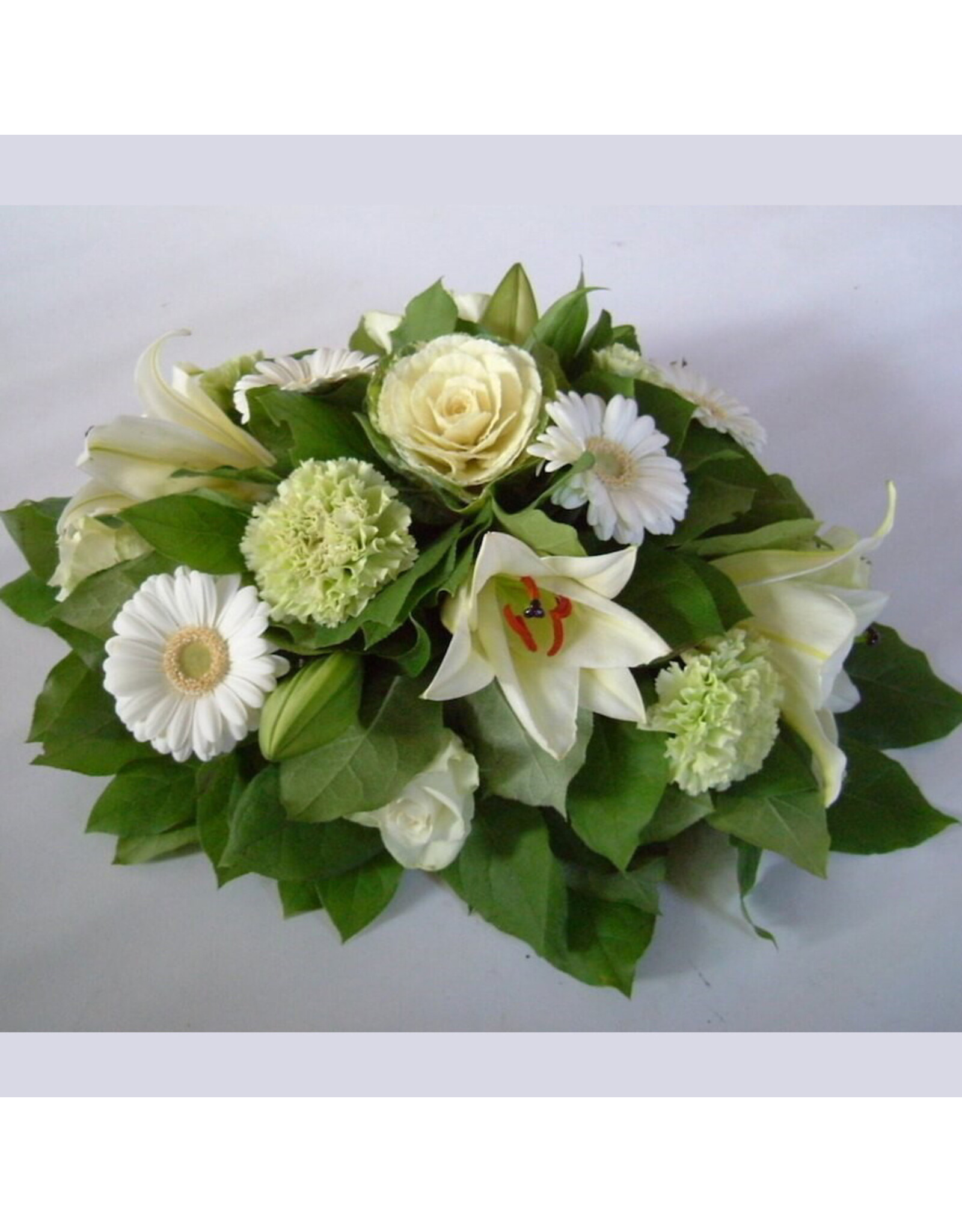 Klein bloemstuk met lelie