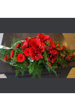 Compact lang bloemstuk met amaryllis