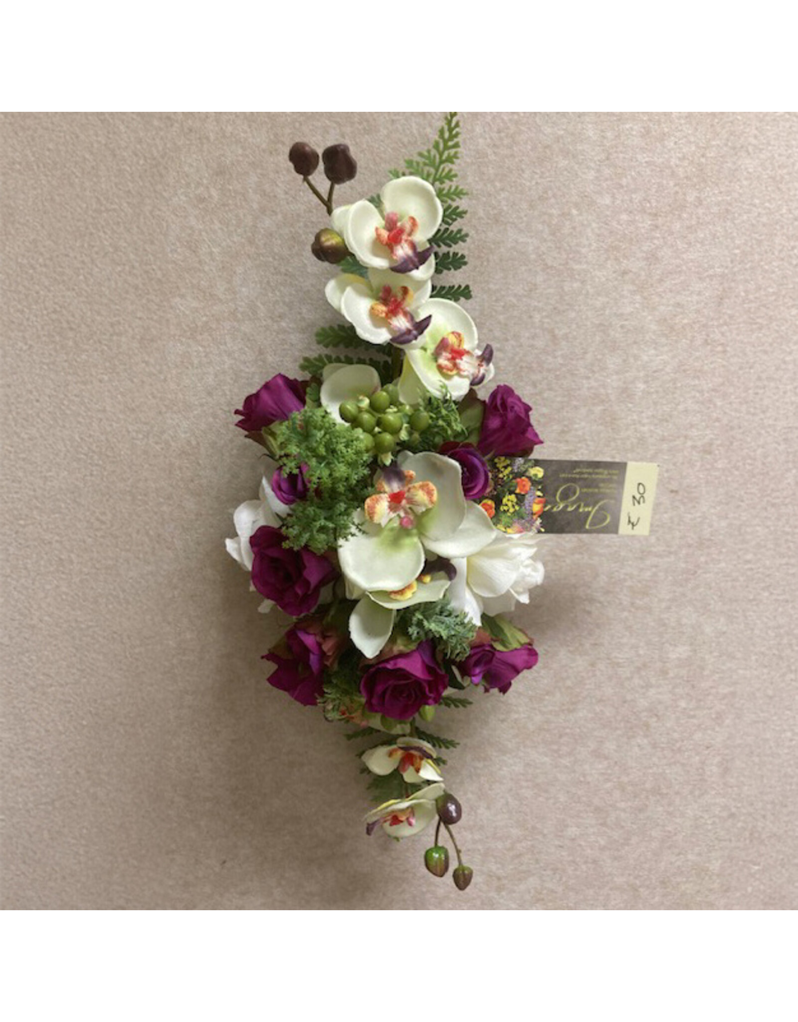 Zijden bloemstuk paars 30 euro