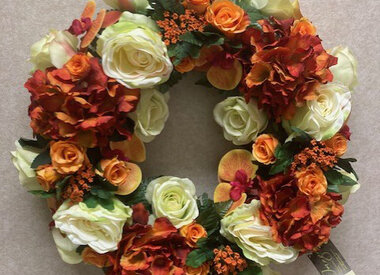Zijden bloemstuk oranje