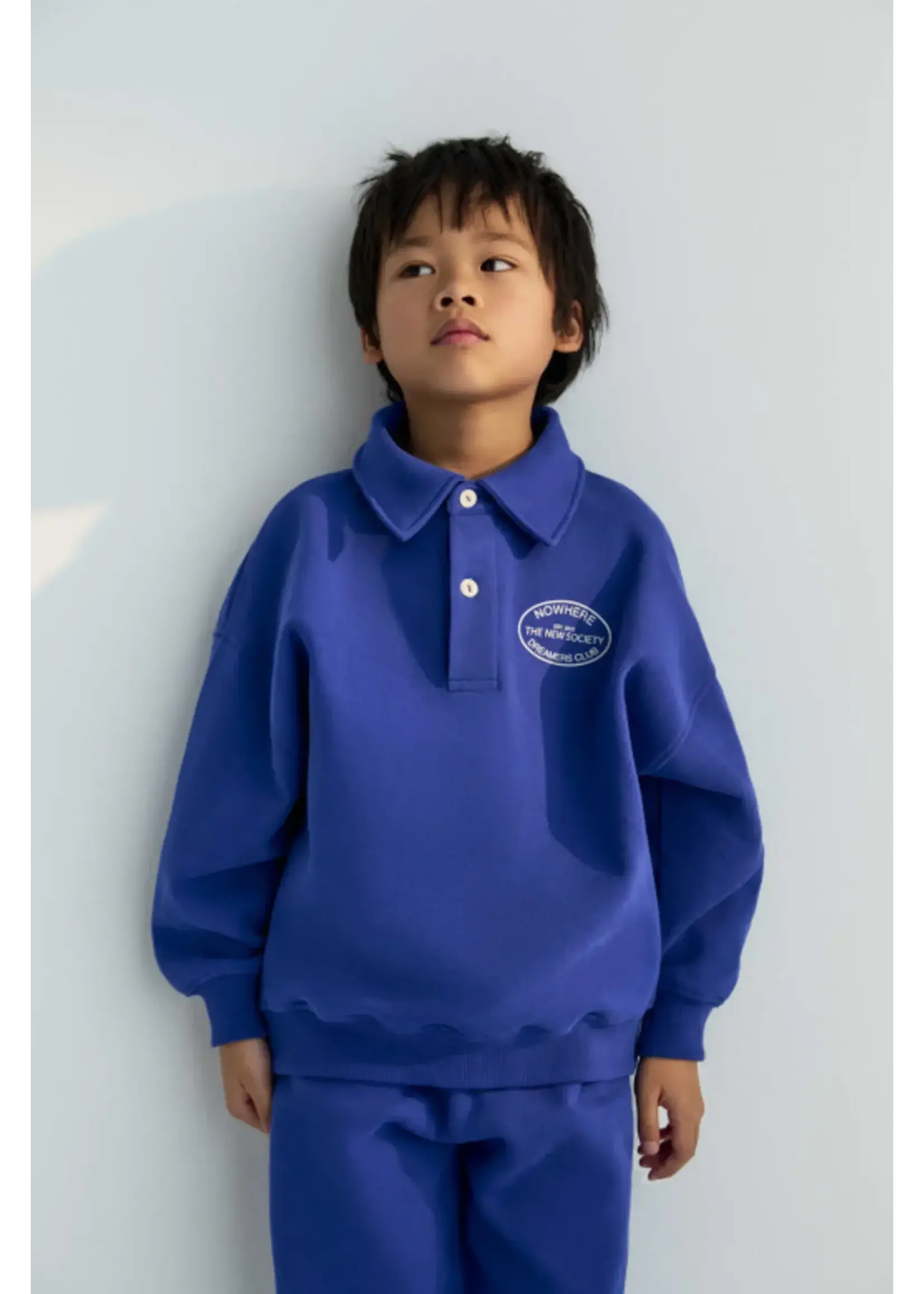 THE NEW SOCIETY *THE NEW SOCIETY NICO POLO