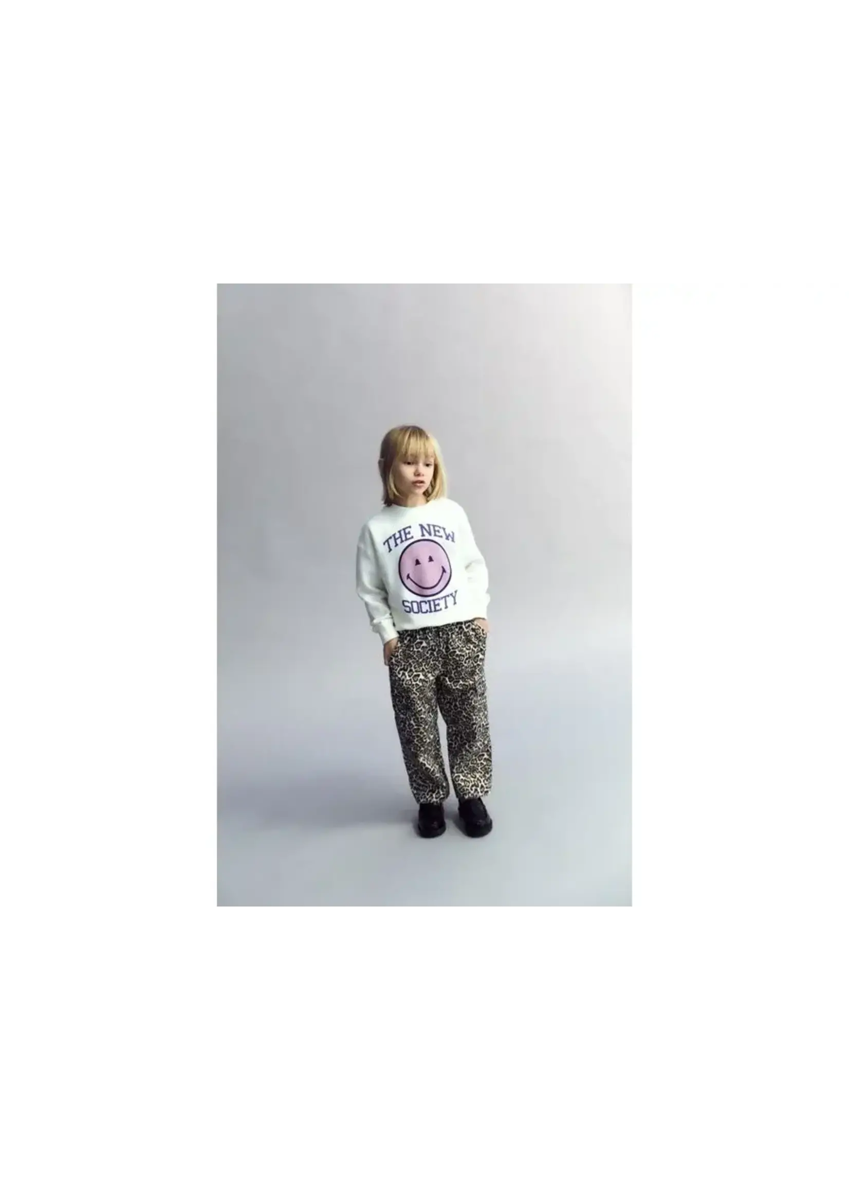 THE NEW SOCIETY *THE NEW SOCIETY NELIA PANT