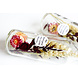 Dried flowers in a bottle with flower seeds Dried flowers in a bottle with flower seeds