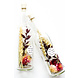 Droogbloemen in een fles met bloemzaadjes Droogbloemen in een fles met bloemzaadjes