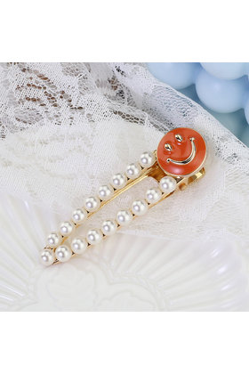 Haarknip offwhite smiley oranje