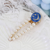 Haarknip offwhite smiley blauw