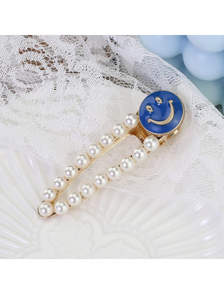 Haarknip offwhite smiley blauw