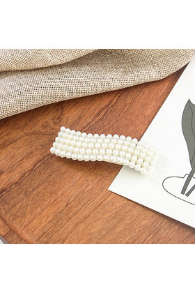 Haarknip met pareltjes golfvorm