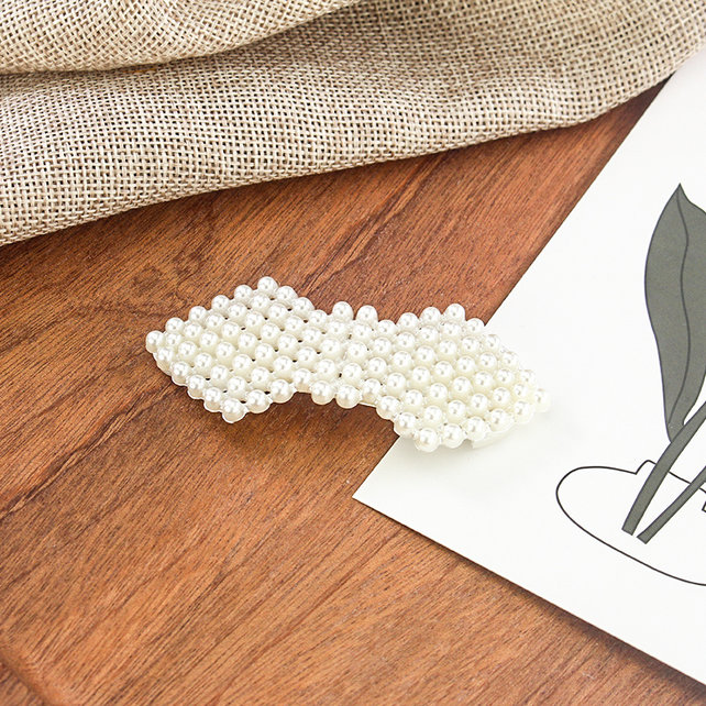 Haarknip met pareltjes ruitvorm