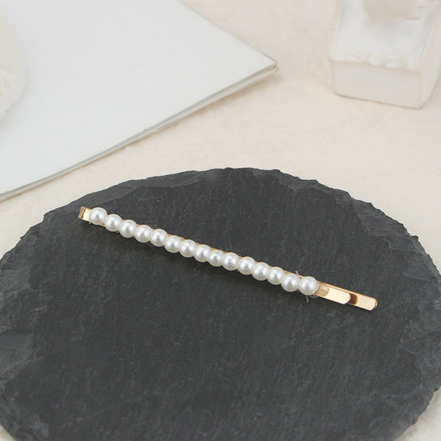 Haarspeld / haarschuif met kleine parels langwerpig