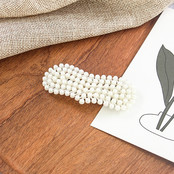 Haarknip met pareltjes langwerpig hart