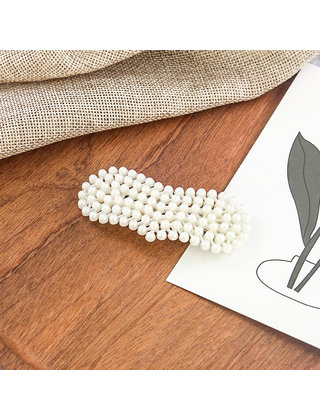 Haarknip met pareltjes langwerpig hart