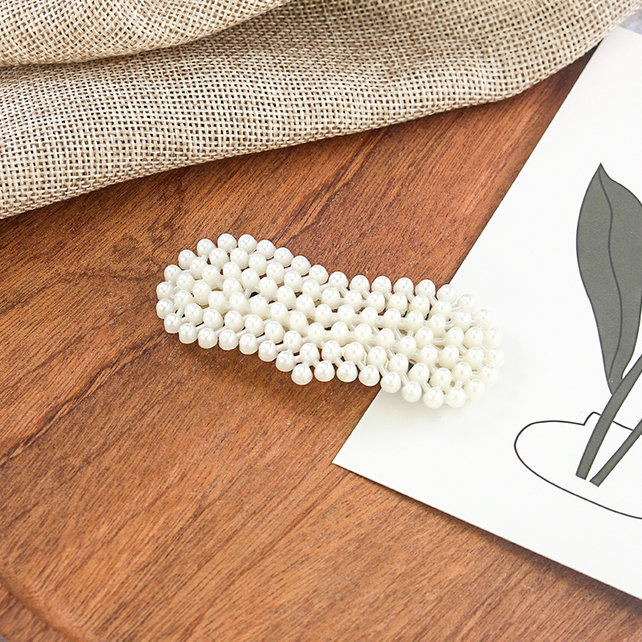 Haarknip met pareltjes langwerpig hart