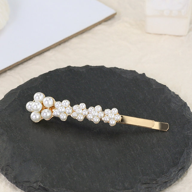 Haarspeld / haarschuif met parelbloemetjes