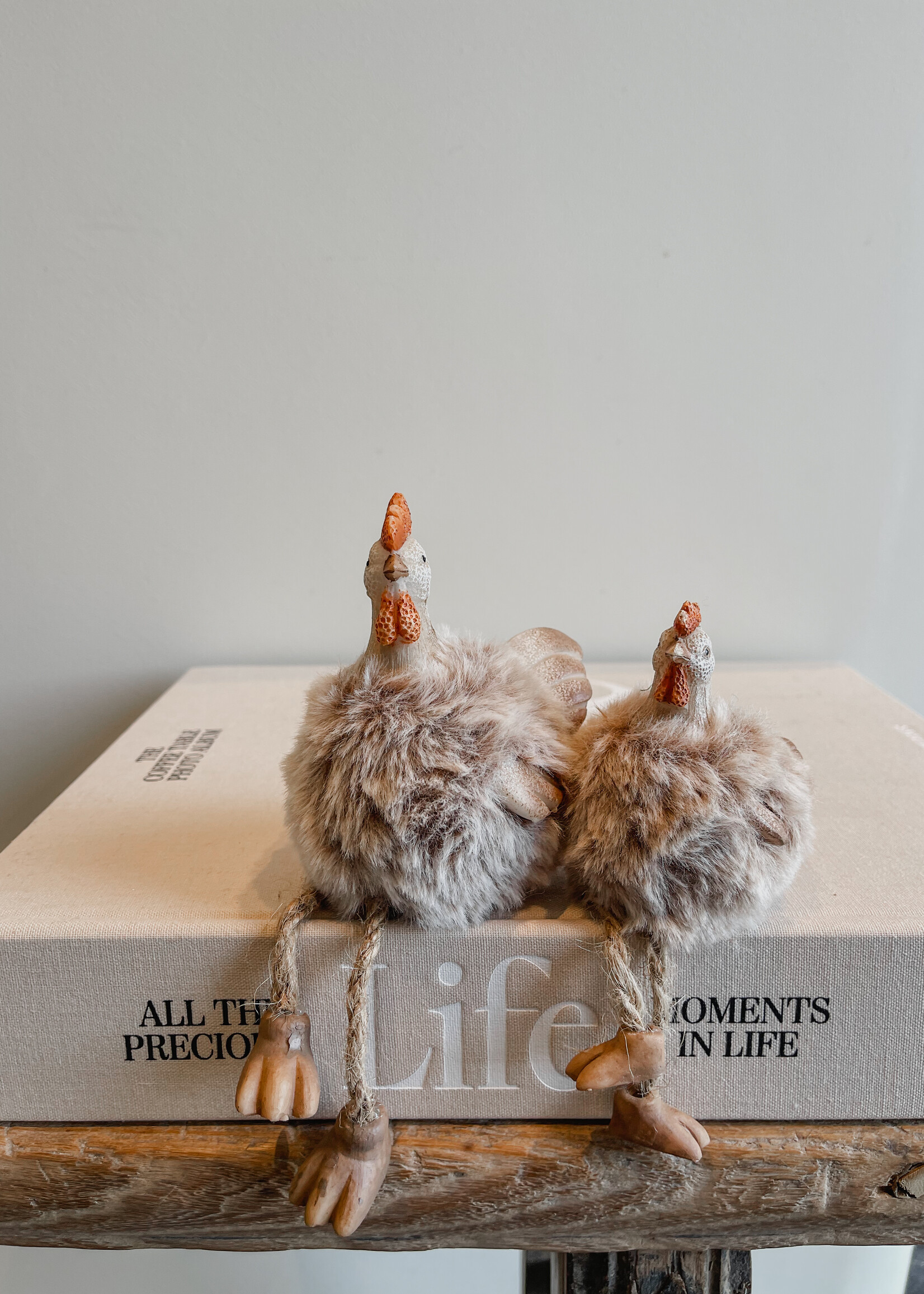 Kip hangpootjes fluffy S