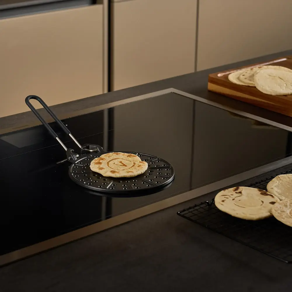 Victoria Cast iron arepa grill and heat diffuser with foldable handle