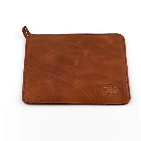 Victoria Leather trivet for hot cast iron cookware