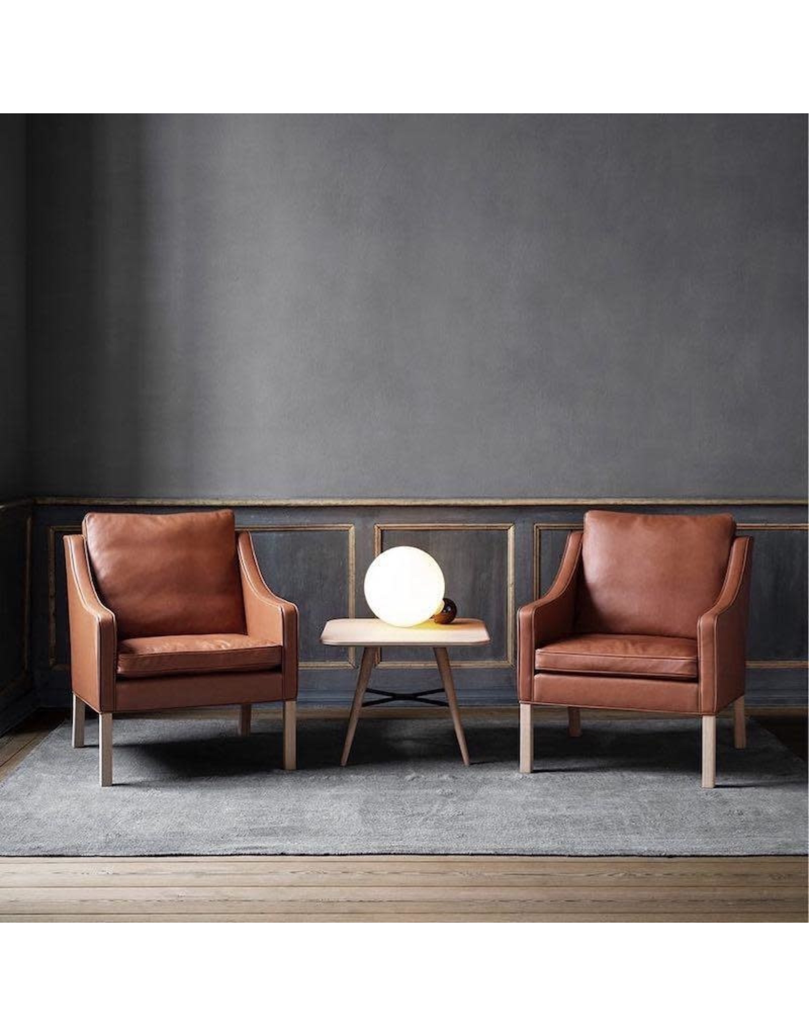 2207 LOUNGE CHAIR UPHOLSTERED IN WALNUT LEATHER