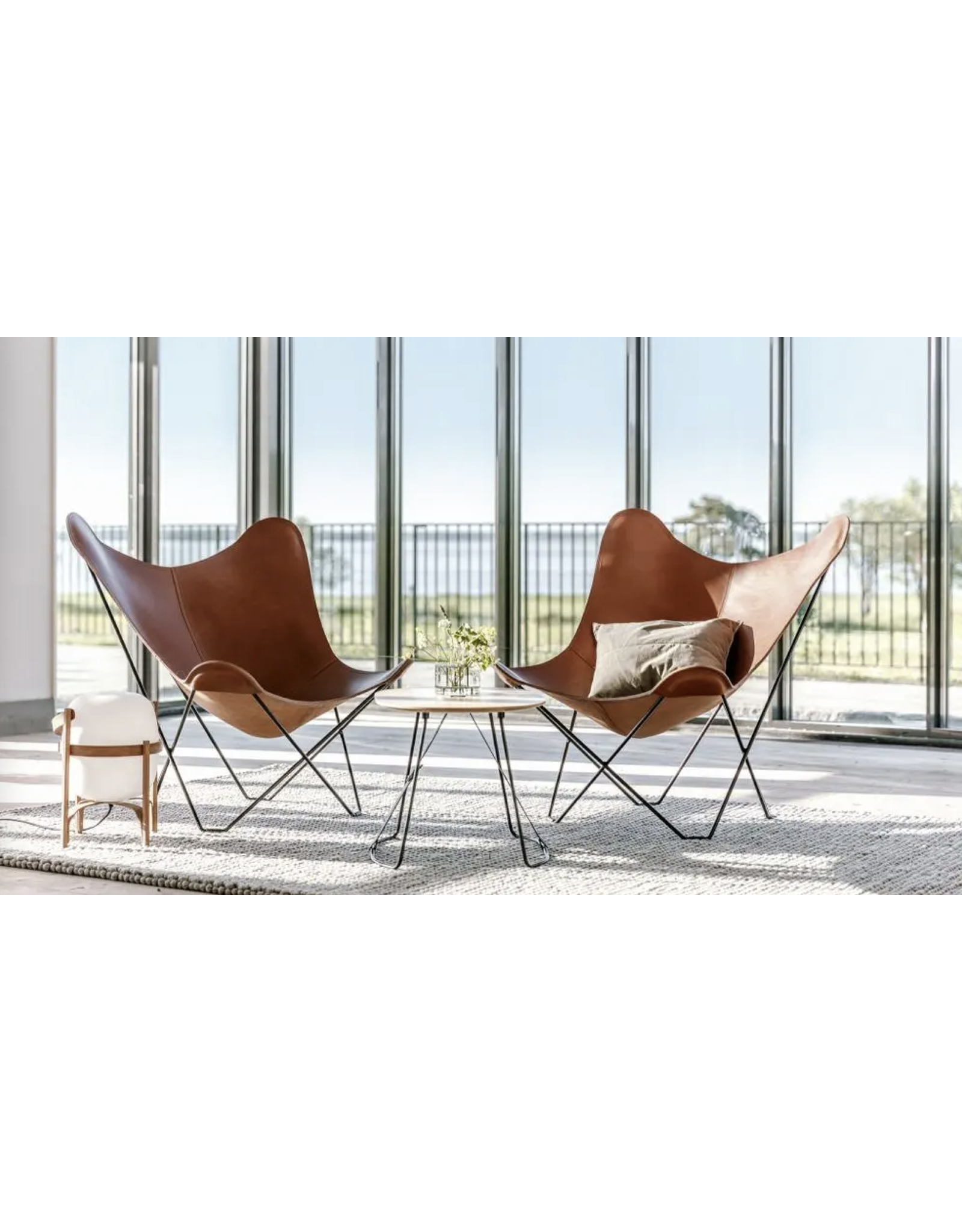 (SHOWROOM ITEM) THE LEATHER BUTTERFLY CHAIR