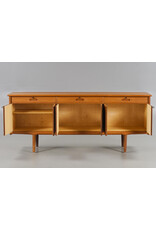 1960'S TEAK SIDEBOARD WITH CARVED RELIEF DOORS