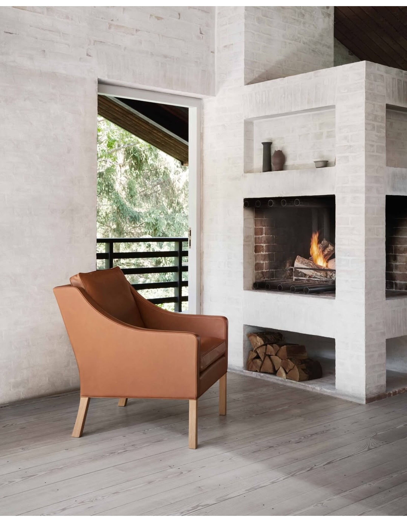 2207 LOUNGE CHAIR UPHOLSTERED IN WALNUT LEATHER