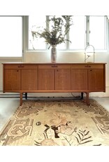 1960'S TEAK SIDEBOARD WITH CARVED RELIEF DOORS