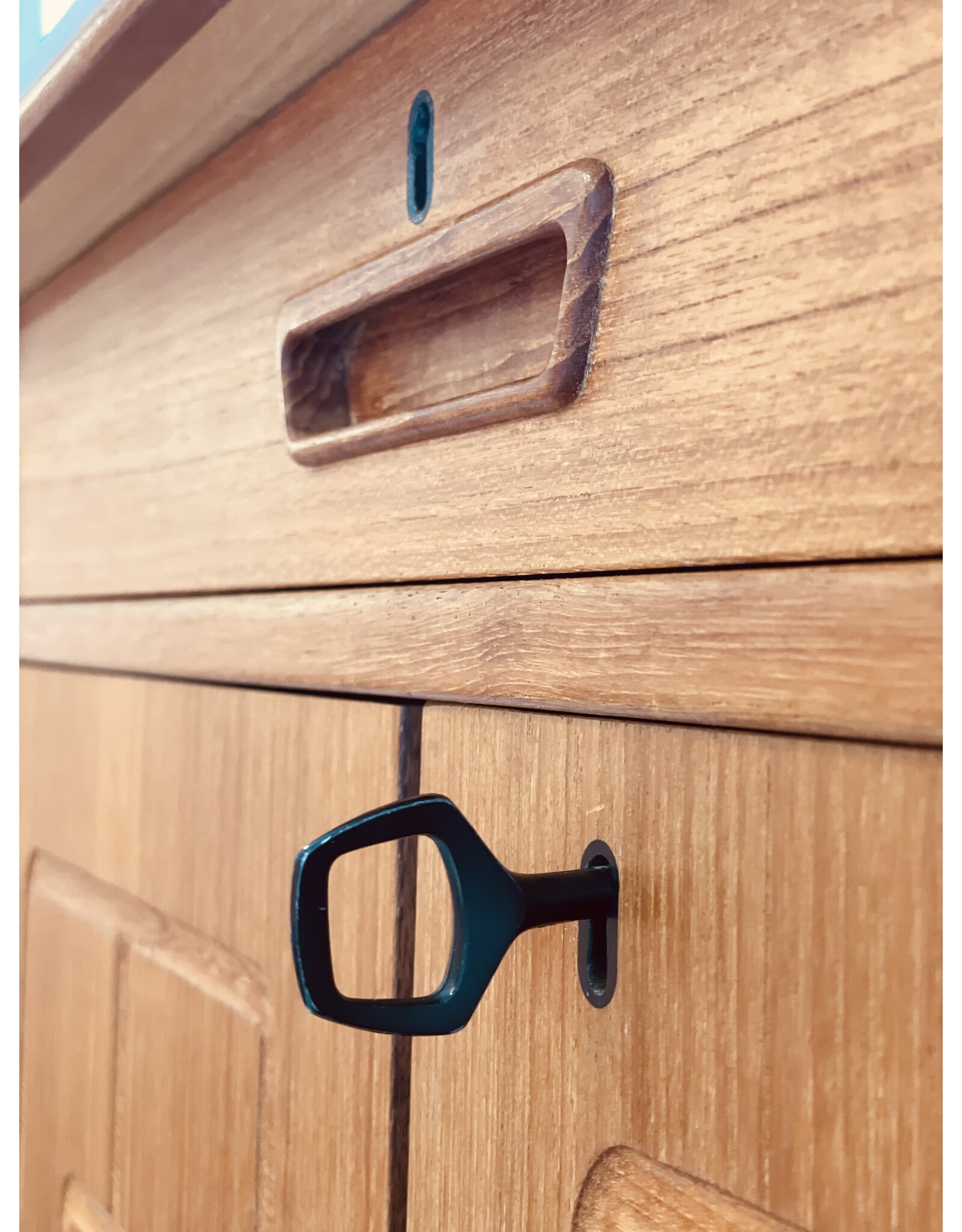 1960'S TEAK SIDEBOARD WITH CARVED RELIEF DOORS