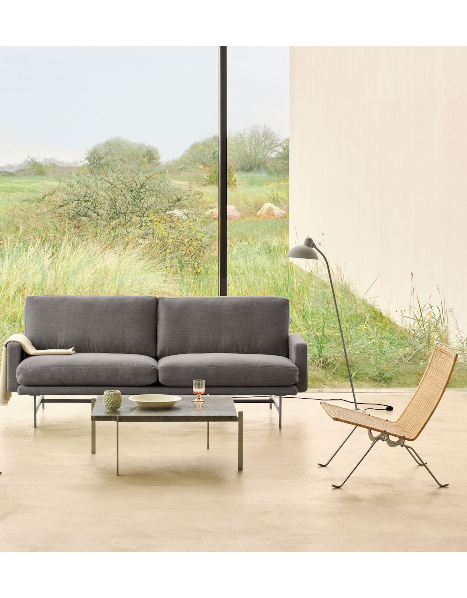 PK22 LOUNGE CHAIR IN WICKER