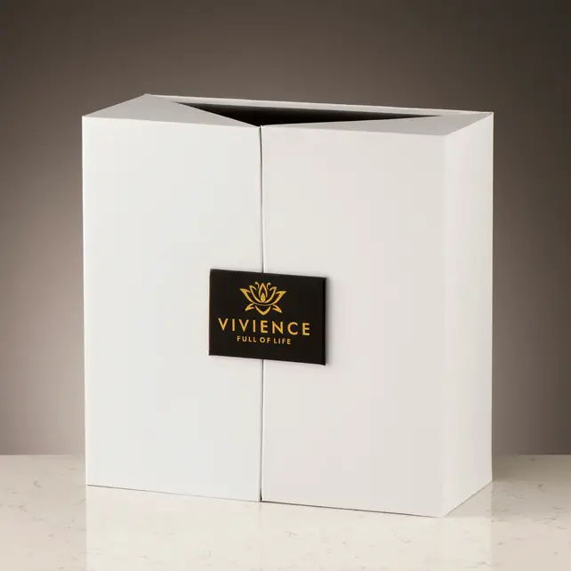 Diffuseur de bouteille en or Vivience avec capuchon doré et fleur blanche, parfum « Muguet »