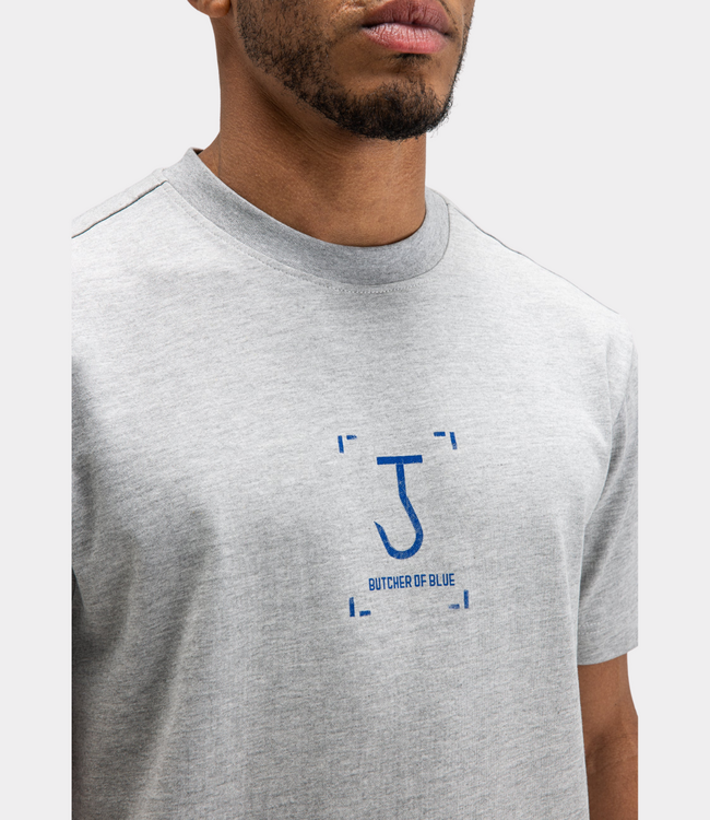 Butcher of Blue Manifest loose tee grey melange – oversized heren T-shirt met graphic artwork en moderne streetwear uitstraling