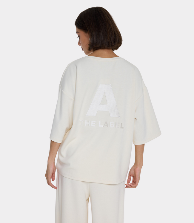 Alix the Label Scuba v neck top cream