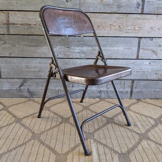 Vintage stalen klapstoel bruin