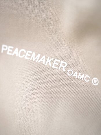 Peacemaker PEACEMAKER BY OAMC FLOWER LOOSE FIT HOODIE SAND Peacemaker PEACEMAKER BY OAMC FLOWER LOOSE FIT HOODIE SAND