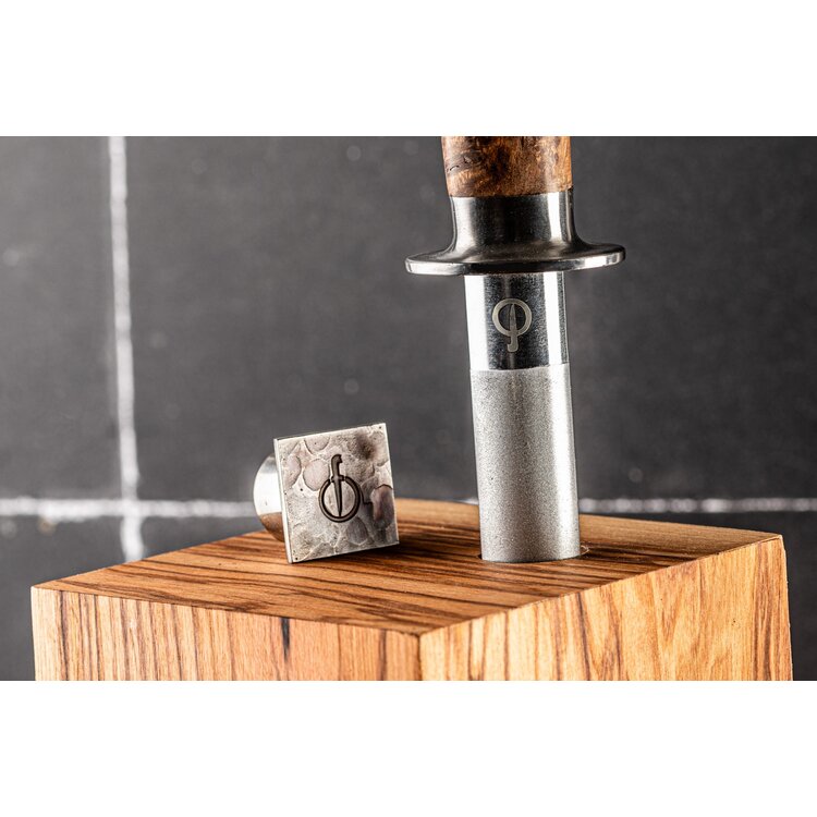 Forged Forged Messenblok roterend, olijfhout