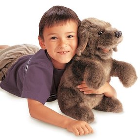 Zittende hond handpop