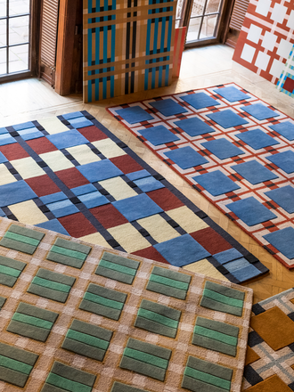 Layered Evelina Kroon wool rug