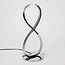 Design tafellamp Infinita in chroom met geïntegreerde LEDs