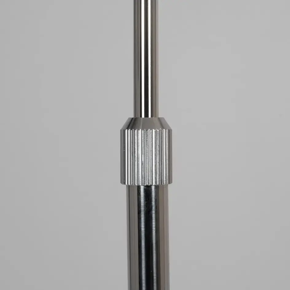 Gebogen staande lamp Bowie in chroom met zwart marmer