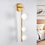 3-lichts wandlamp Taj  - witte bollen en goud