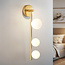 Gouden wandlamp Taj