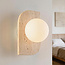 Wandlamp Artea van travertin (natuursteen) met glazen bol