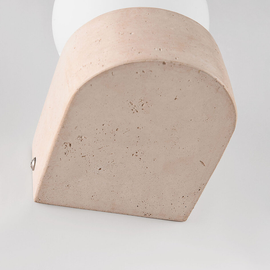 Wandlamp Alessa van travertin (natuursteen) met glazen bol