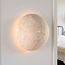 Wandlamp Tavro met instelbaar licht en travertin (natuursteen)
