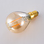 E14 dimbare LED filament lamp Ø45 mm met amber glas 2,5W 2200K