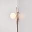 Wandlamp Karise van travertin met glazen bol