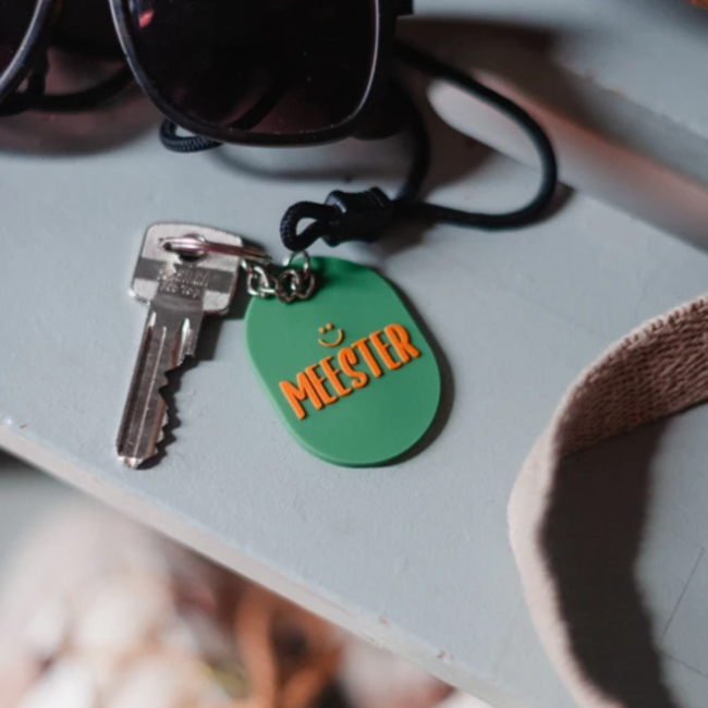 Sleutelhanger ovaal 50x36mm - Meester